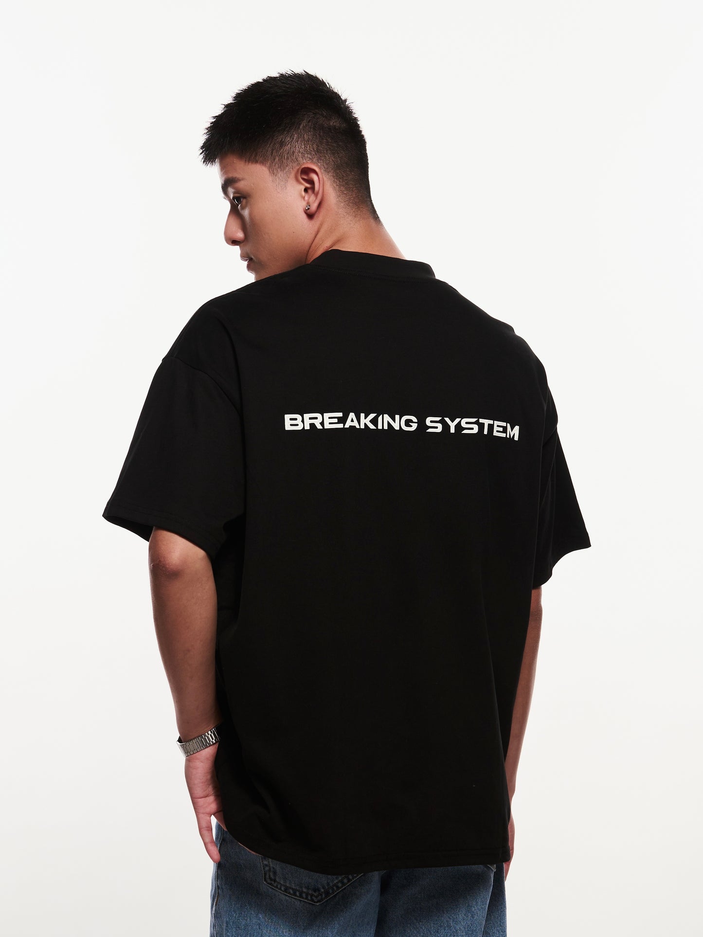 Breaking System Black Tee – Oversized fit, premium streetwear T-shirt for modern urban style